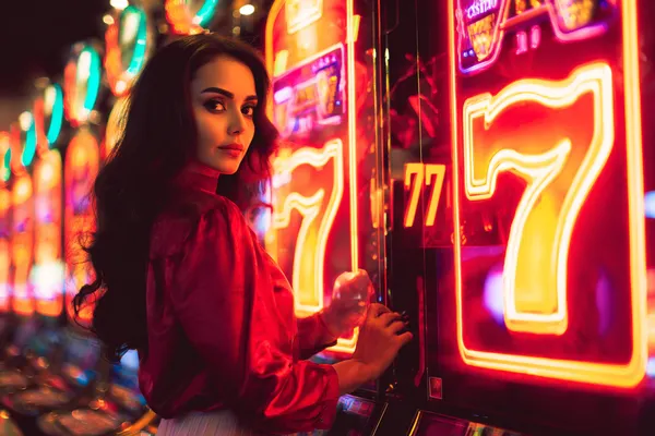 A young woman relaxing with her phone while dynamic casino elements float around her, illustrating the smooth mobile experience offered by the ALWAFA app.